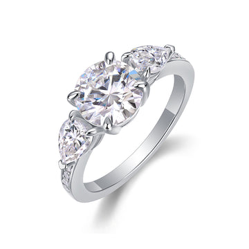 Bague moissanite 3 pierres | Centre rond avec pierres latérales en forme de poire, design creux - Bijou de fiançailles élégant et intemporel